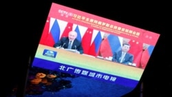 习近平与普京视频会晤 “背靠背战略协作”能走多远? 习近平与普京视频会晤 “背靠背战略协作”能走多远?