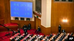 2020年5月28日,中国人大代表就订立港区国安法的决定进行投票。