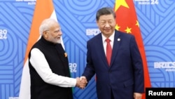 2024年10月23日,中国国家主席习近平和印度总理莫迪在俄罗斯喀山金砖国家峰会期间会晤。