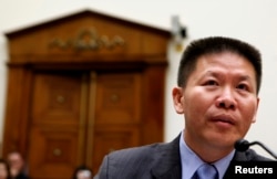 资料照:对华援助协会创始人傅希秋牧师在美国国会的一个听证会上。(2012年5月15日)