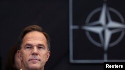 资料照 - 2024 年 10 月 1 日,荷兰前首相马克·吕特在接替延斯·斯托尔滕贝格担任北约秘书长的当天,在比利时布鲁塞尔的北约总部出席北大西洋理事会会议。