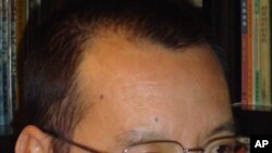 对比新闻:刘晓波和中国政府谁在发抖