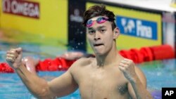 孙杨2017年7月25日在布达佩斯举行的国际泳联游泳世锦赛男子200米自由泳决赛中夺冠。(资料照片)