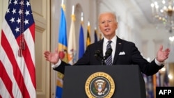 拜登总统3月11日在白宫就新冠疫情一周年发表讲话 (法新社)