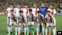 2015年1月22日澳大利亚布里斯班: 中国足球队在亚足联四分之一决赛前留影