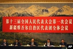 2018年3月13日,中国十三届全国人大一次会议新疆代表团全体会议向媒体开放。 新疆维吾尔自治区主席雪克来提·扎克尔讲话。