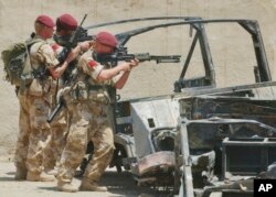 在伊拉克作战的英国陆军。(2003年6月资料照)