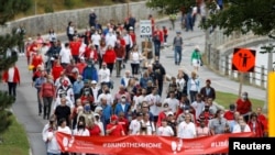 加拿大民众2021年9月5日在渥太华举行集会争取斯帕弗和康明凯获释(路透社)