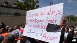 Mourners carry the body of Aysenur Ezgi Eygi, 26, who allegedly was fatally shot by Israeli soldiers while participating in an anti-settlement protest in the West Bank, during her funeral in the West Bank city of Nablus, Sept. 9, 2024.