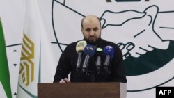 资料照片:穆罕默德·巴希尔在叙利亚反政府武装控制的伊德利卜举行记者会。(2024年11月28日)