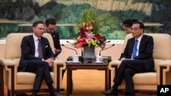 欧盟副主席卡泰宁2018年6月25日会见中国总理李克强(美联社)