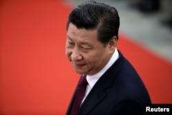 中国国家主席习近平在人民大会堂。2014年12月23日。