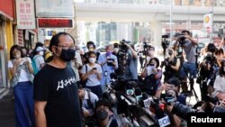 香港支联会公司秘书蔡耀昌在该会特别会员大会通过解散后会见记者。(2021年9月25日)