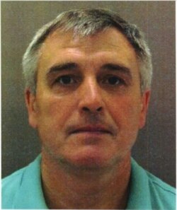 Фотографія з британської візи у російському паспорті на ім’я Сергія Федотова