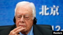 美国前总统卡特在北京大学的座谈会上(资料照片,2012年12月12日)