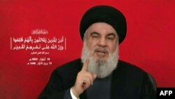 从真主党的电视视频的截图显示,2024年9月19日,黎巴嫩激进组织首领哈桑·纳斯鲁拉在一个未公开的地点向全国发表讲话。(法新社照片)