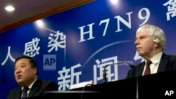 中国政府负责H7N9禽流感梁万年疫情防控事务的负责人梁万年与世界卫生组织在中国的首席代表迈克尔•奥利里