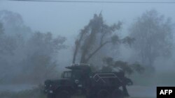 ဟာရီကိန်း Ida လူဝီစီယားနားပြည်နယ်ကို ဝင်ရောက်စဉ် (ဓာတ်ပုံ - AFP)