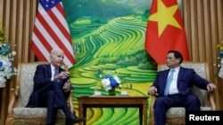 资料照片:美国总统拜登2023年9月11日在河内与越南总理范明正会晤。