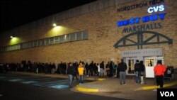 A member of staff at satellite communications company Inmarsat works in front of a screen showing subscribers using their service throughout the world, at their headquarters in London. Britain's Inmarsat used a wave phenomenon discovered in the nineteenth century to analyze the seven pings its satellite picked up from Malaysia Airlines Flight MH370 to determine its final destination.
