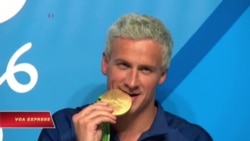 Các VĐV bơi của Mỹ nói chuyện với cảnh sát về vụ cướp Các VĐV bơi của Mỹ nói chuyện với cảnh sát về vụ cướp