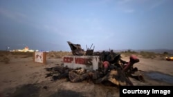 加州自由雕塑公园的《中共病毒》雕像遭烧毁 (推特图片/赵昕提供)