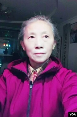 要求北京市政府公开雷洋案和解协议内容的北京市民谢小玲。(资料照片)