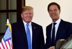 2018年7月2日特朗普(左)在白宫欢迎荷兰首相马克·吕特