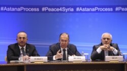 资料照片:土耳其(左)、俄罗斯(中)和伊朗(右)三国外长主持叙利亚问题阿斯塔纳和谈。(2018年3月16日)