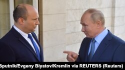 资料照片:以色列总理贝内特与俄罗斯总统普京在俄罗斯索契举行会谈(2021年10月22日)