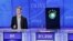 'Jeopardy!' champion Ken Jennings with an IBM computer called 'Watson.'