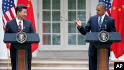 美国总统奥巴马与中国国家主席习近平在白宫记者会上(2015年9月25日)