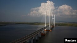 2016年9月11日,尚未完工的新鸭绿江大桥,连接辽宁丹东新区和朝鲜新义州。