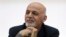 FILE - Afghanistan's President Ashraf Ghani listens to a journalist during a press conference.