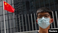 香港民主活动人士黄之锋2020年6月3日对港版国家安全法表示忧虑(路透社)