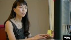 金海翎撰写报告(美国之音国符拍摄)