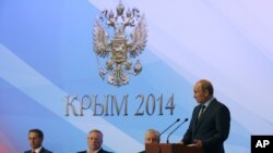 俄罗斯总统普京在克里米亚雅尔塔附近对俄罗斯国家杜马成员发表讲话。(2014年8月14日)