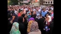 埃及人掩埋死者 冲突双方不退让  埃及人掩埋死者 冲突双方不退让