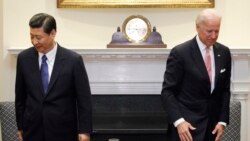 资料照片:时任美国副总统拜登在白宫接待到访的时任中国国家副主席习近平。(2012年2月14日)