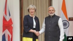 ဗြိတိန်ဝန်ကြီးချုပ် ထရီဇာ မေနဲ့ အိန္ဒိယဝန်ကြီးချုပ်