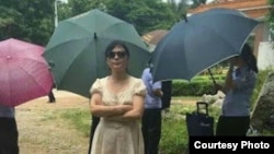 郭飞雄姐姐杨茂平在监狱外(维权网图片)