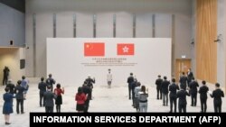 香港政府发布的照片显示,特首林郑月娥在政府中心听取香港政府官员效忠港府的宣誓。(2020年12月16日)