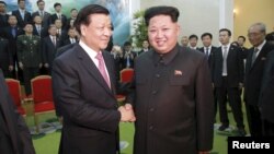 朝鲜领导人金正恩会见中共政治局常委刘云山率领的中共访朝代表团 (2015年10月)