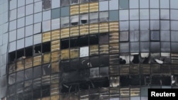 2024 年 12 月 21 日,位于俄罗斯中部的喀山遭到乌克兰军队的无人机袭击。图为被无人机击中的一幢多层居民楼。