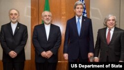 Держсекретар Джон Керрі, міністр Мохаммад Джавад Заріф, міністр Ернест Моніз і голова ядерної програми Ірану Алі Акбар Салегі