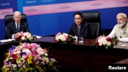 2022年5月23日,美国总统拜登、印度总理莫迪和日本首相岸田文雄出席在日本东京泉花园画廊举行的“印度-太平洋经济框架”启动活动。(路透社)