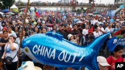 资料照:菲律宾民众在马尼拉抗议中国在南中国海的行径。 (2019年7月22日)