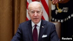 2022年1月20日,拜登总统在与基础设施建设特别工作组举行会议前就乌克兰局势向媒体发表讲话。(路透社)