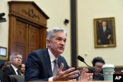 资料照:美联储主席鲍威尔在众议院金融委员会作证。(2019年7月10日)