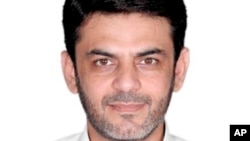 资料照片:美国司法部提供的阿西夫·麦钱特的照片。